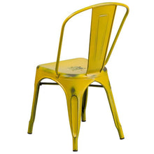 Load image into Gallery viewer, Distressed Yellow Metal Indoor-Outdoor Stackable Chair