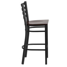 Load image into Gallery viewer, HERCULES Series Black Ladder Back Metal Restaurant Barstool - Walnut Wood Seat